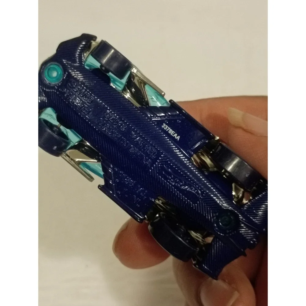 Hot Wheels Marvel Character Cars Vision Die-Cast Toy Car Teal Chrome 1:64 Scale